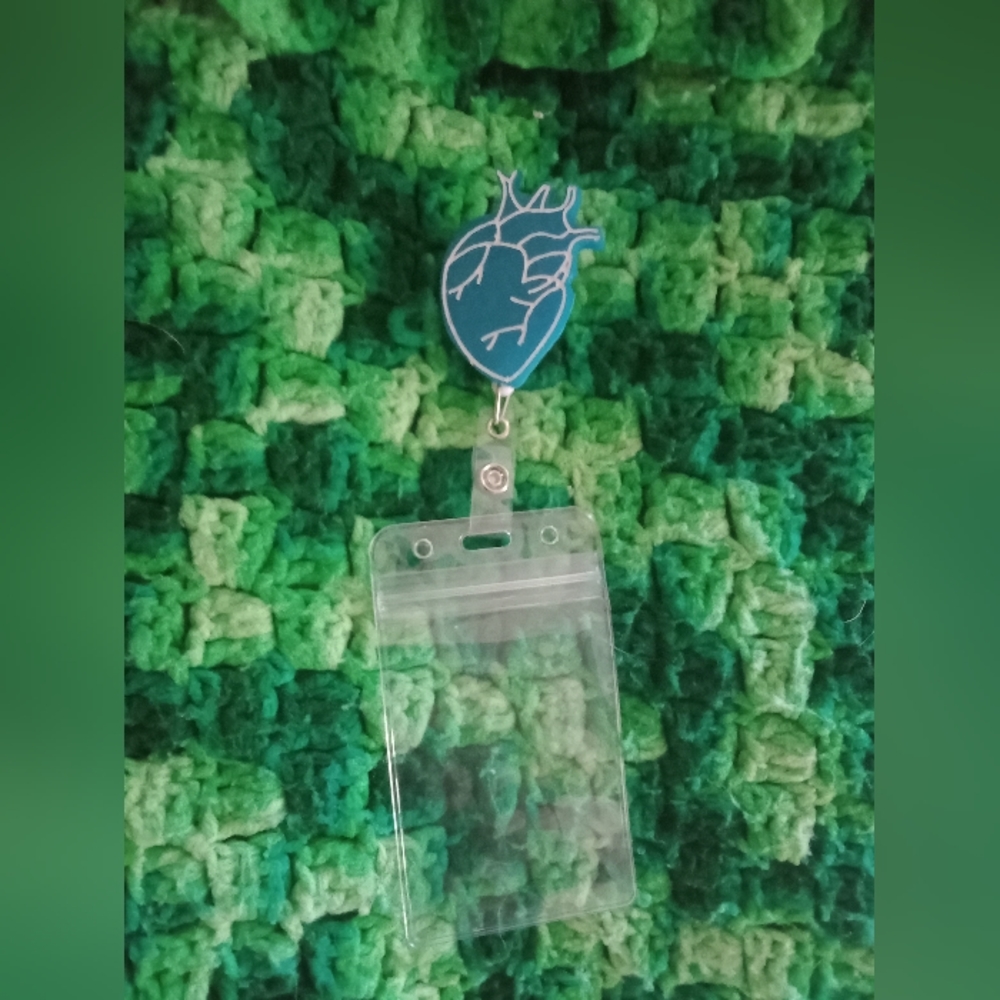 Badge reel with card holder